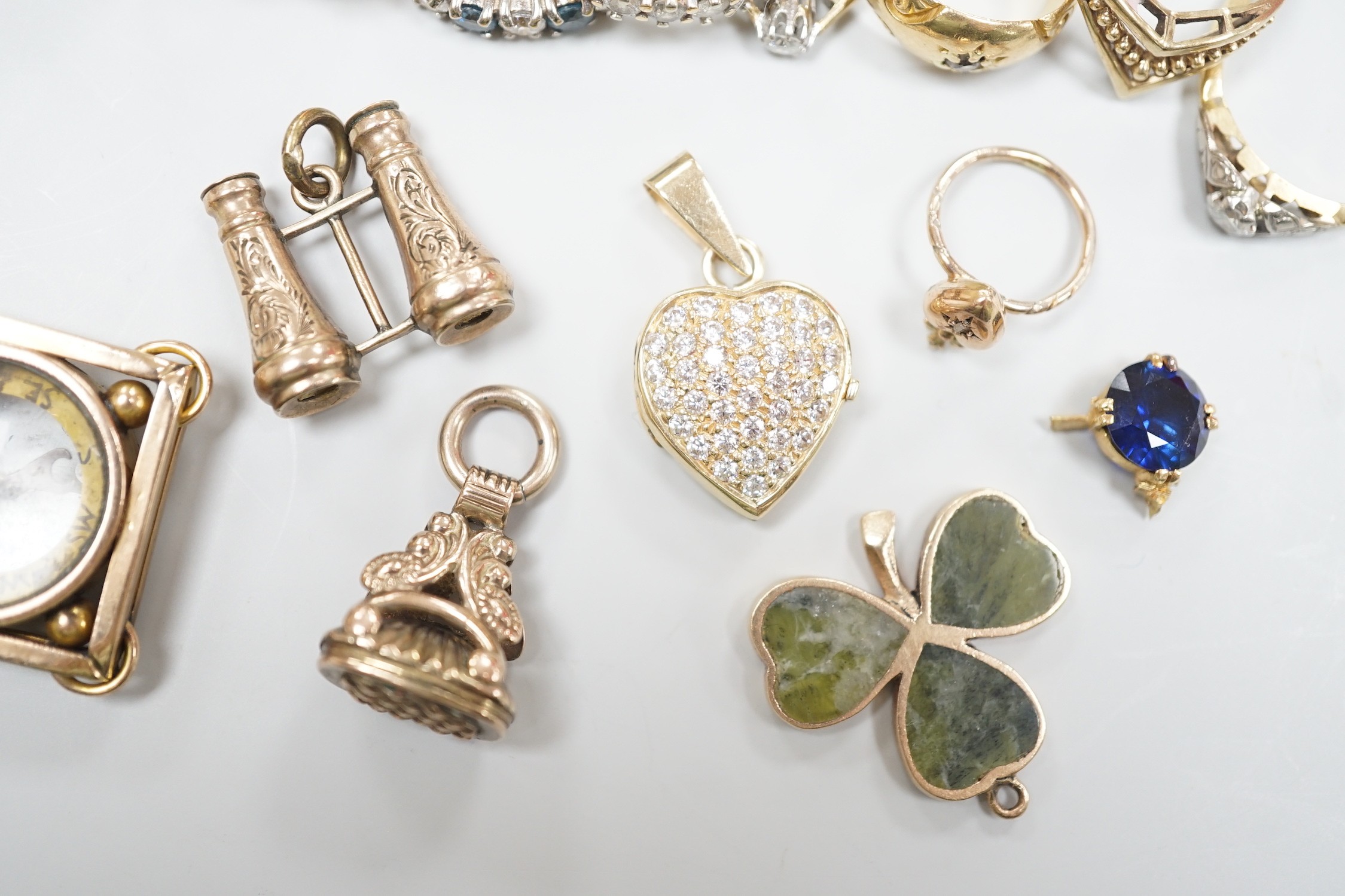 A small collection of Edwardian and later jewellery, including an 18ct gold and diamond chip set ring, size G, an 18ct and small solitaire diamond ring, size N/O and an 18k and single stone ring by Mikimoto, size L, 18ct